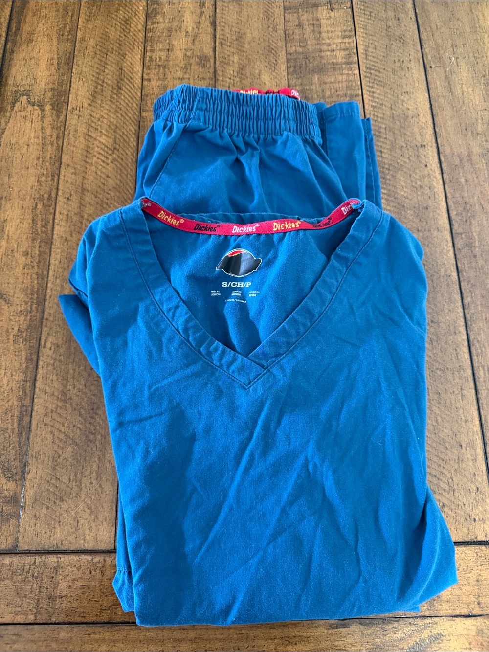 Dickies Women's Short Sleeve V-Neck Top in Teal Blue with Red Trim